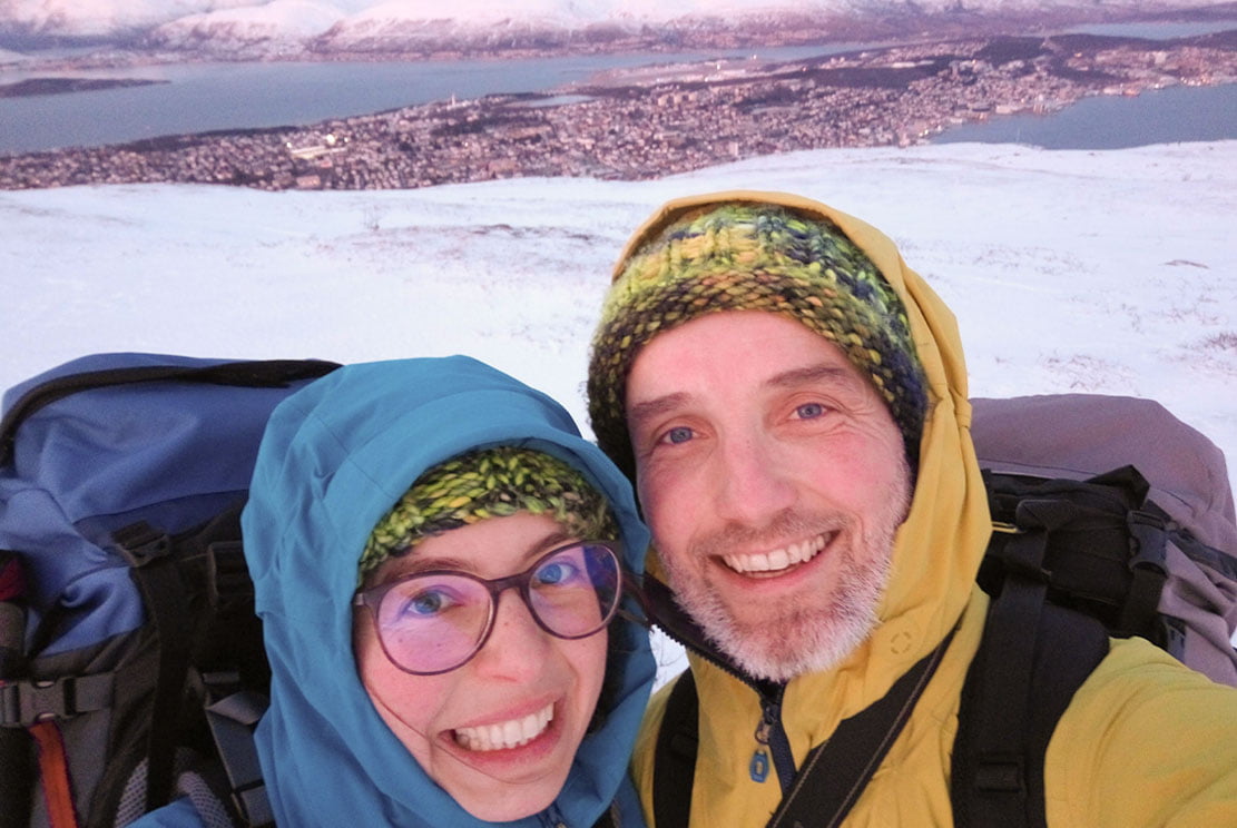 Jozef-and-Meline-in-the-Arctic-Circle-on-a-mountain-overseeing-the-city-of-Tromso